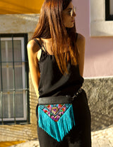 Bag Of Hope BOH blue tassel multicolour embroidered waist bag leather shoulder bag on model