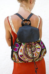 Snake Swirl BOH embroidered leather backpack handbag close up model